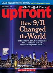 Cover of Upfront magazine, the Twin Towers lit up against a dark New York City skyline